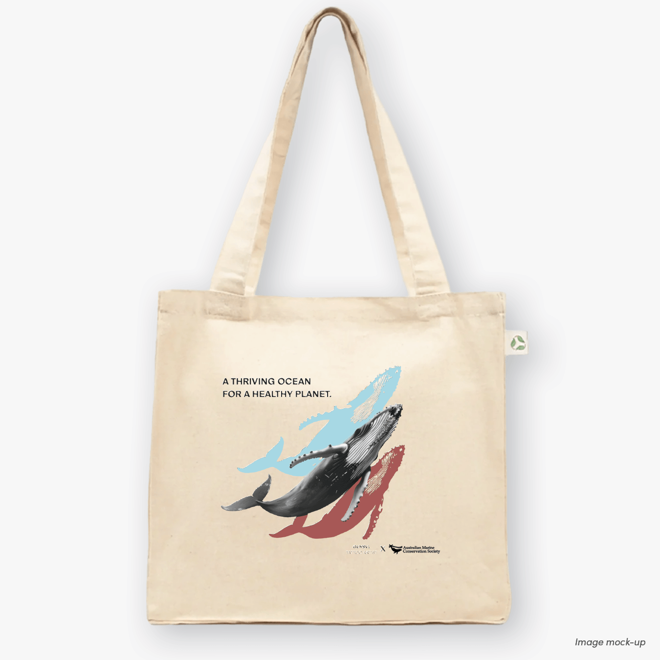 Natural canvas tote bags featuring screen-printed artwork of a humpback whale by Guy Shoval, together with the AMCS vision statement: "A thriving ocean for a healthy planet".