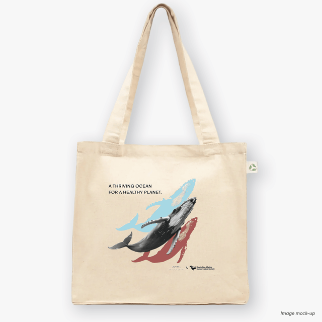 Natural canvas tote bags featuring screen-printed artwork of a humpback whale by Guy Shoval, together with the AMCS vision statement: "A thriving ocean for a healthy planet".