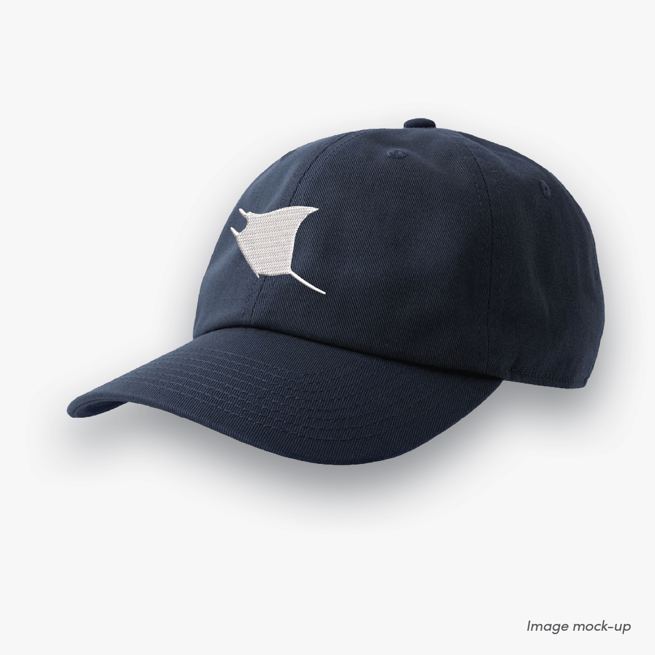 Navy-coloured Ocean Icons Dad cap with manta ray embroidery centred.