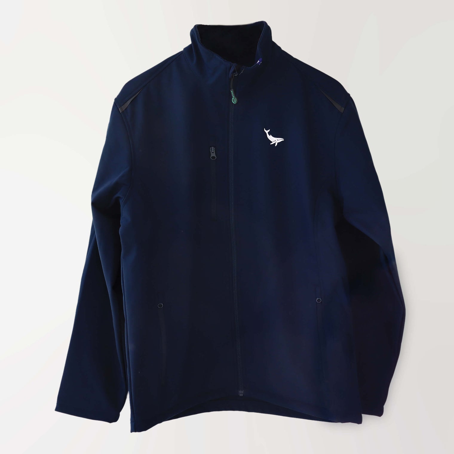 Navy spray jacket embroidered in white with a humpback whale (front).