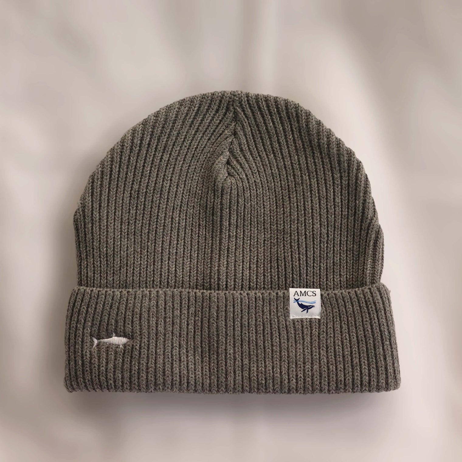 Ocean Icons organic cotton, grey beanie embroidered with a shark in white thread.