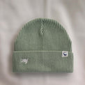 Ocean Icons organic cotton, sage beanie embroidered with a turtle in white thread.