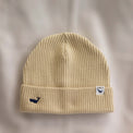 Ocean Icons organic cotton, beige beanie embroidered with a whale in navy thread.