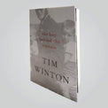 'The Boy Behind The Curtain' book cover (front) by multi award-winning Australian author and AMCS Patron, Tim Winton, featuring an image of a father with two children on a motorcycle.