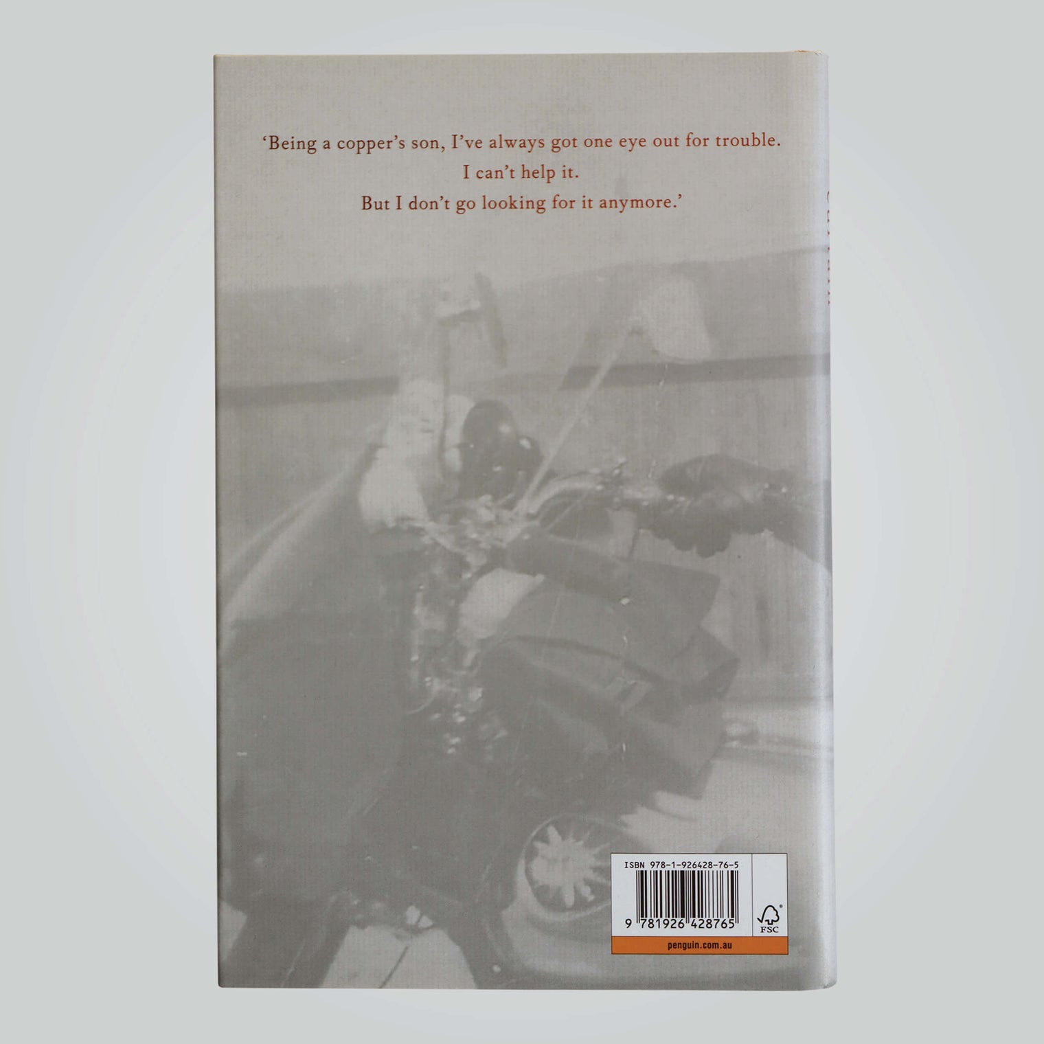 'The Boy Behind The Curtain' book cover (back) by multi award-winning Australian author and AMCS Patron, Tim Winton, featuring an image of a motorcycle.