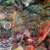 Close-up of the 'Ocean Life' buff fabric by Headsox in the multicoloured 'Coral Sea’ design.