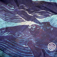 Close-up of the 'Ocean Life' buff fabric by Headsox in the multicoloured 'Whale Song’ design.