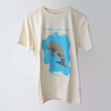 Era 1970s organic cotton, short sleeve, beige t-shirt (front) with print of a dugong on bright blue water.