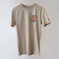 Sand-coloured 'Fight Plastic' organic cotton t-shirt (front) with navy and orange print artwork of a fist.