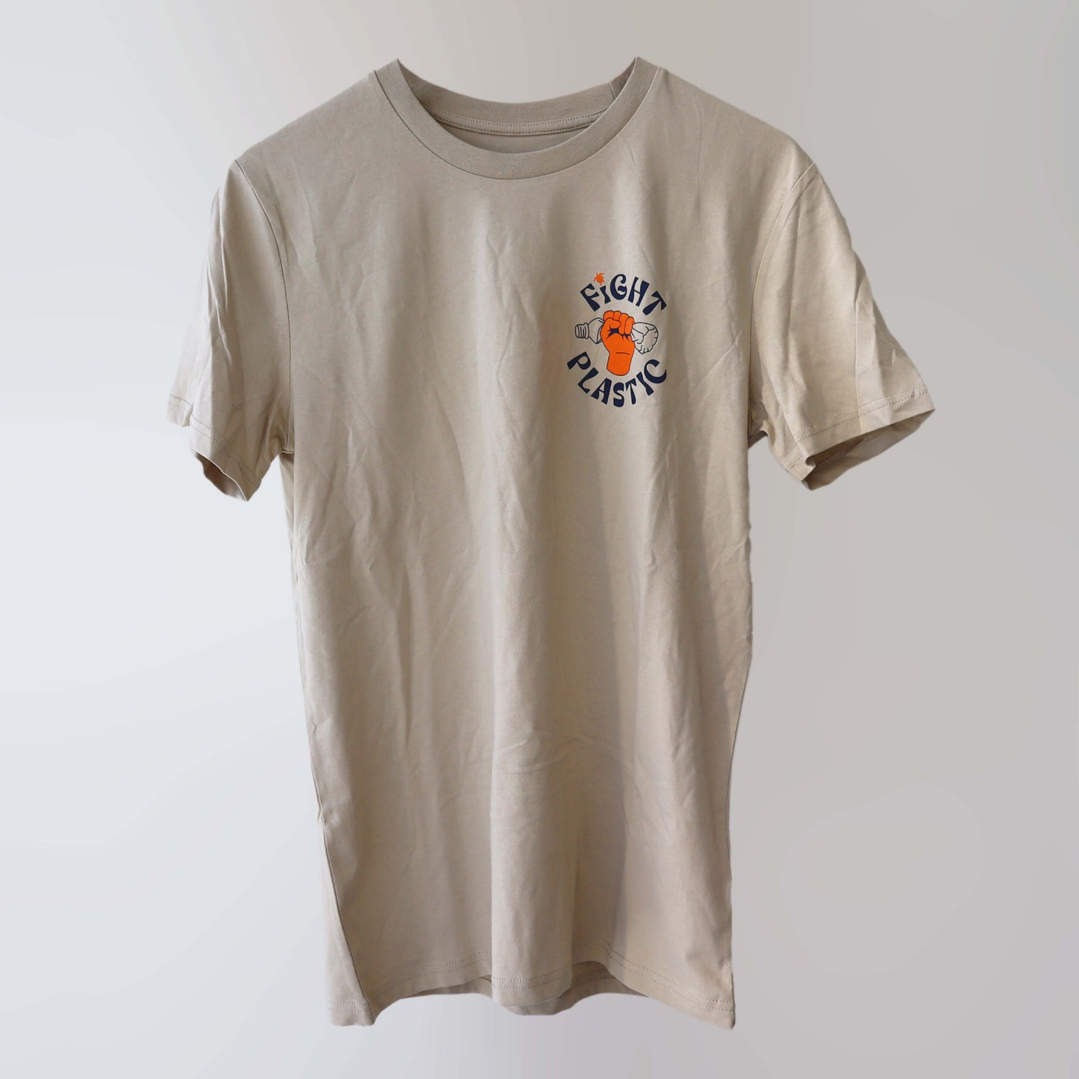 Sand-coloured 'Fight Plastic' organic cotton t-shirt (front) with navy and orange print artwork of a fist.