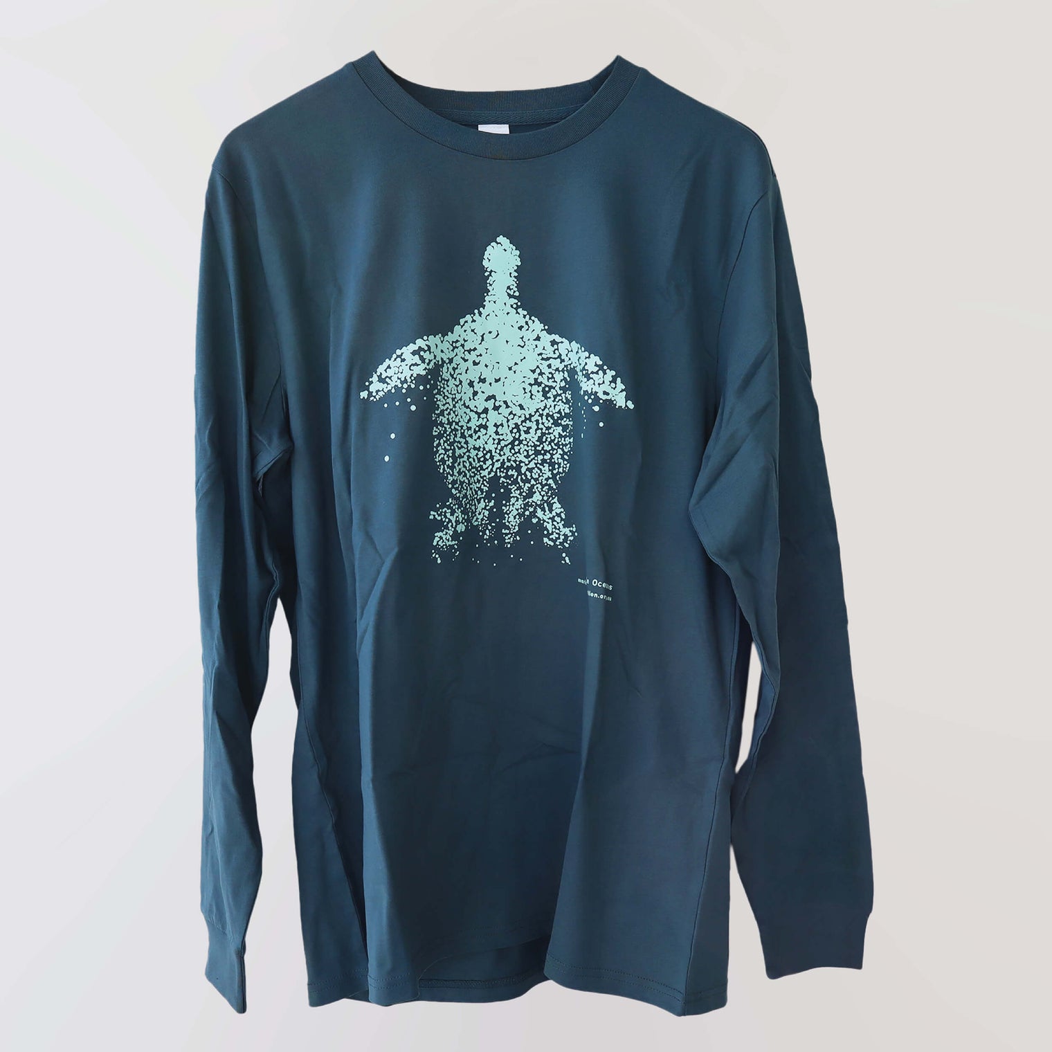 Fragile Oceans organic cotton, long sleeve, teal t-shirt with turtle print rendered in water bubbles.