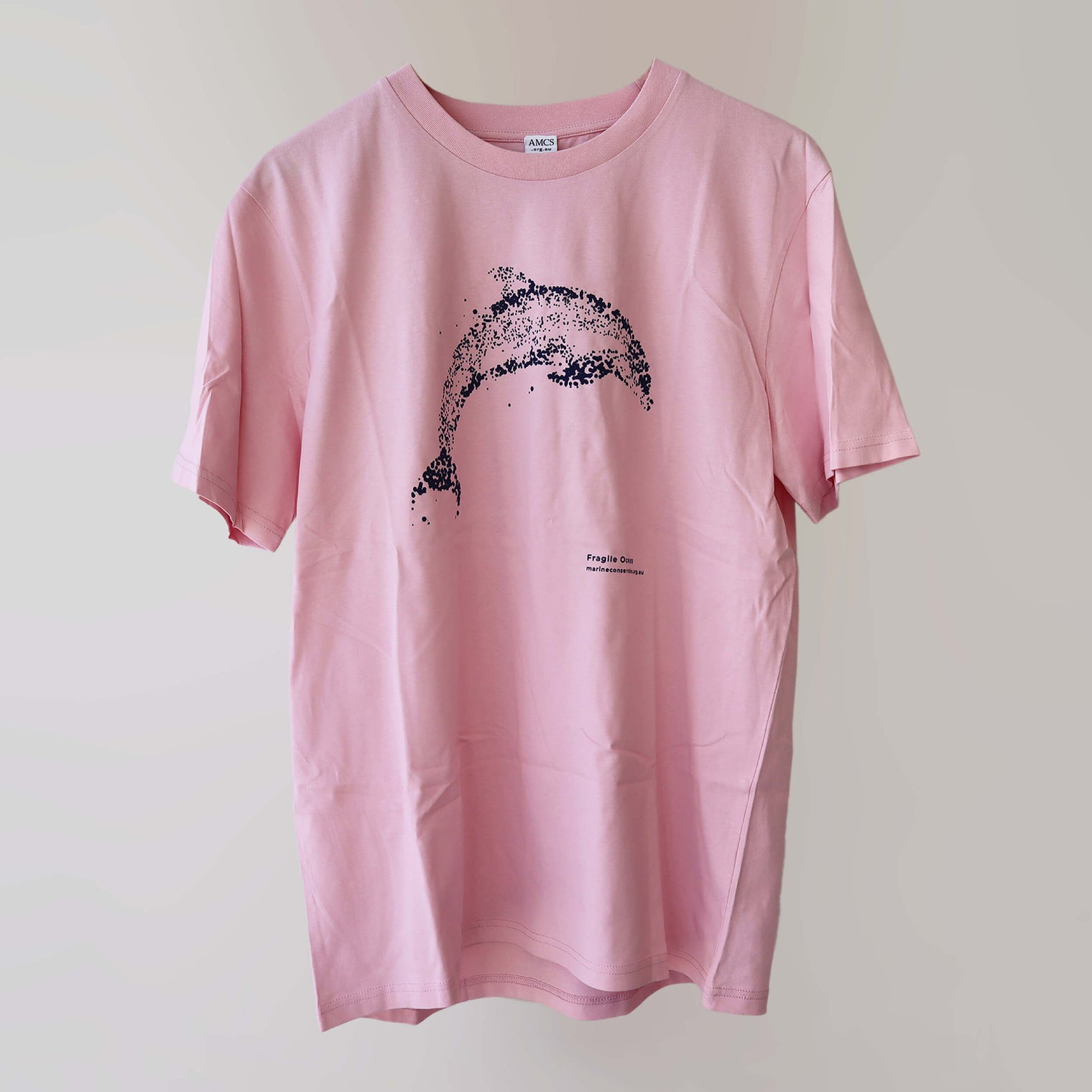 Fragile Oceans organic cotton, short sleeve, pink t-shirt with dolphin print rendered in water bubbles.