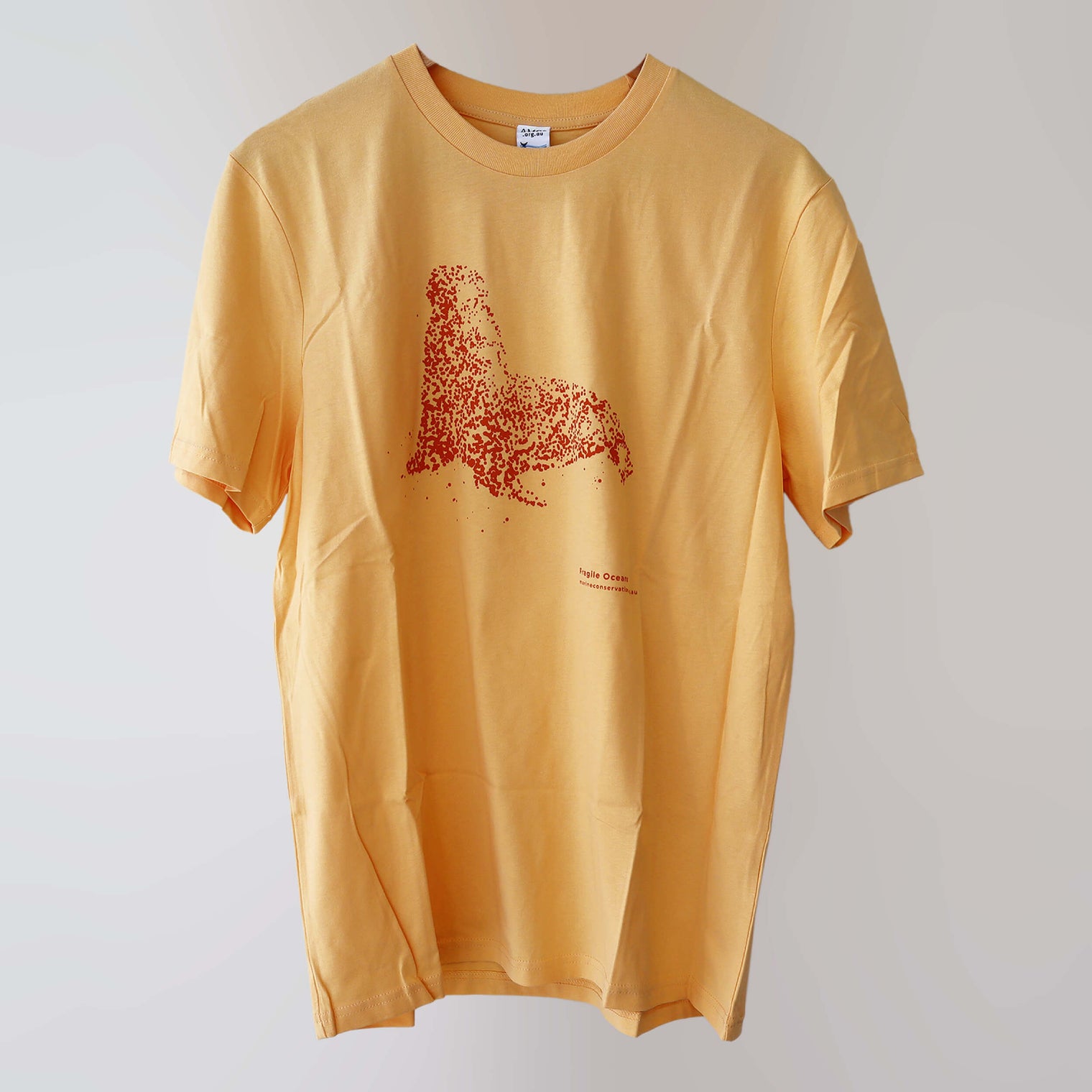Fragile Oceans organic cotton, short sleeve, orange t-shirt with seal print rendered in water bubbles.