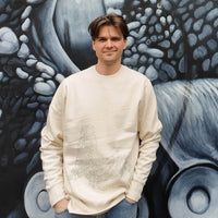 Fragile Oceans natural raw sweatshirt with Australian sea lion screen print worn by our AMCS team.