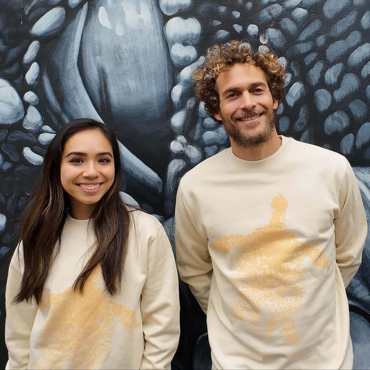 Fragile Oceans pale yellow sweatshirt with turtle screen print worn by our AMCS team.