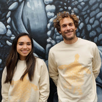 Fragile Oceans pale yellow sweatshirt with turtle screen print worn by our AMCS team.