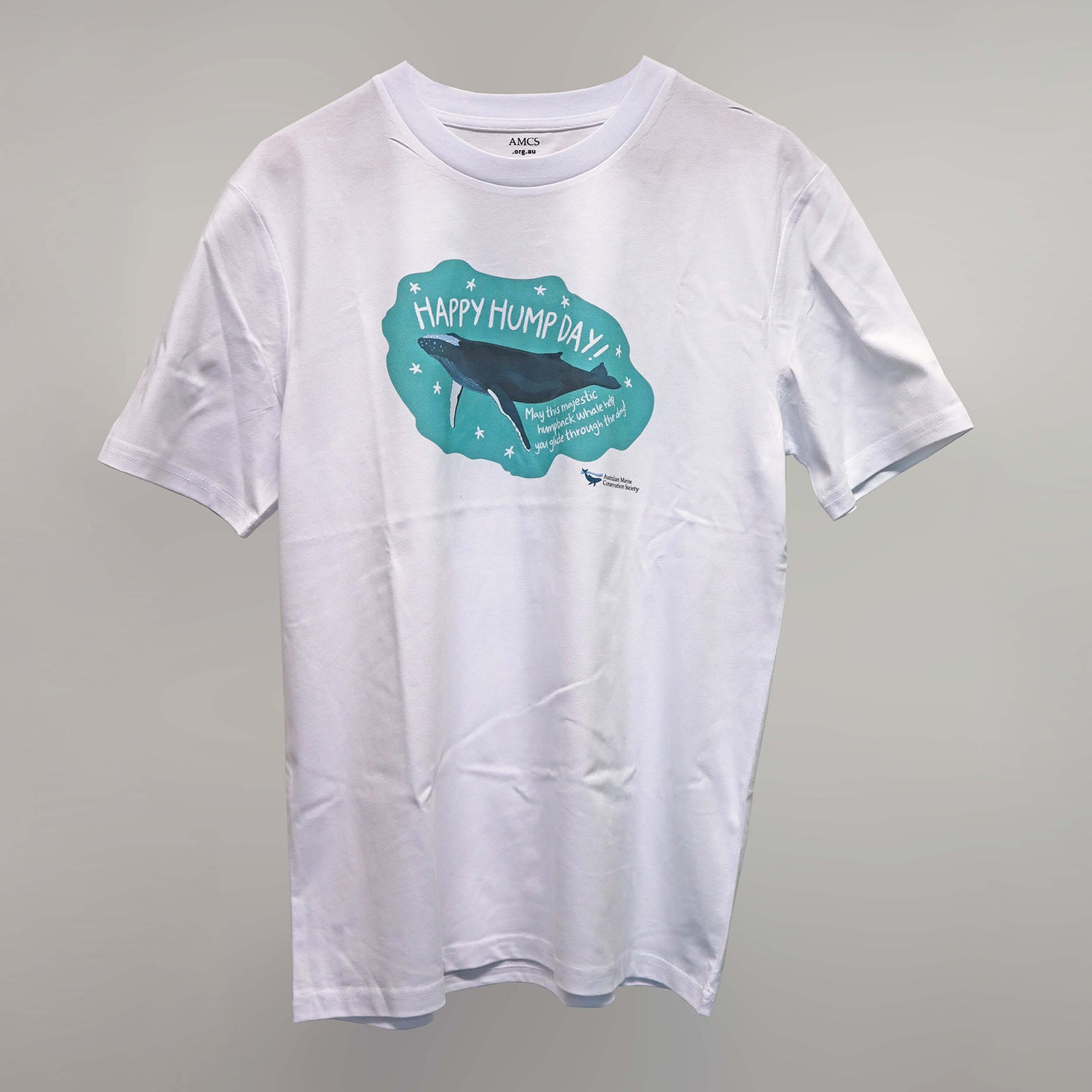 'Happy Hump Day!' organic cotton, short sleeve white t-shirt with a navy and green illustration print of a humpback whale by Red Parka.