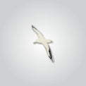 Lapel pin of an albatross by Red Parka. 