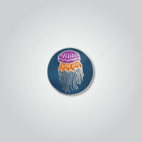 Lapel pin of a lion's mane jellyfish by Red Parka. 