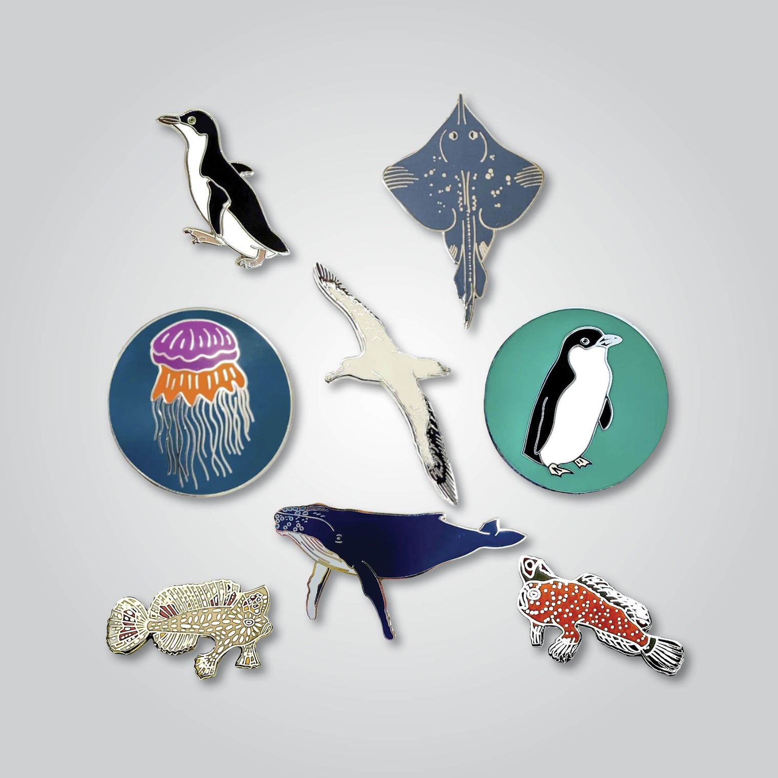 Lapel pin collection of marine wildlife by Red Parka.