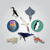 Lapel pin collection of marine wildlife by Red Parka.