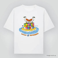 Mock-up image of the 'Nature is for everyone' t-shirt (front) in organic cotton with a print of Mulga the Artist's artwork of two seabirds, 'Marty and Geoff the Seagulls', standing on a Rubik's Cube and text underneath 'Difficult but not impossible'.