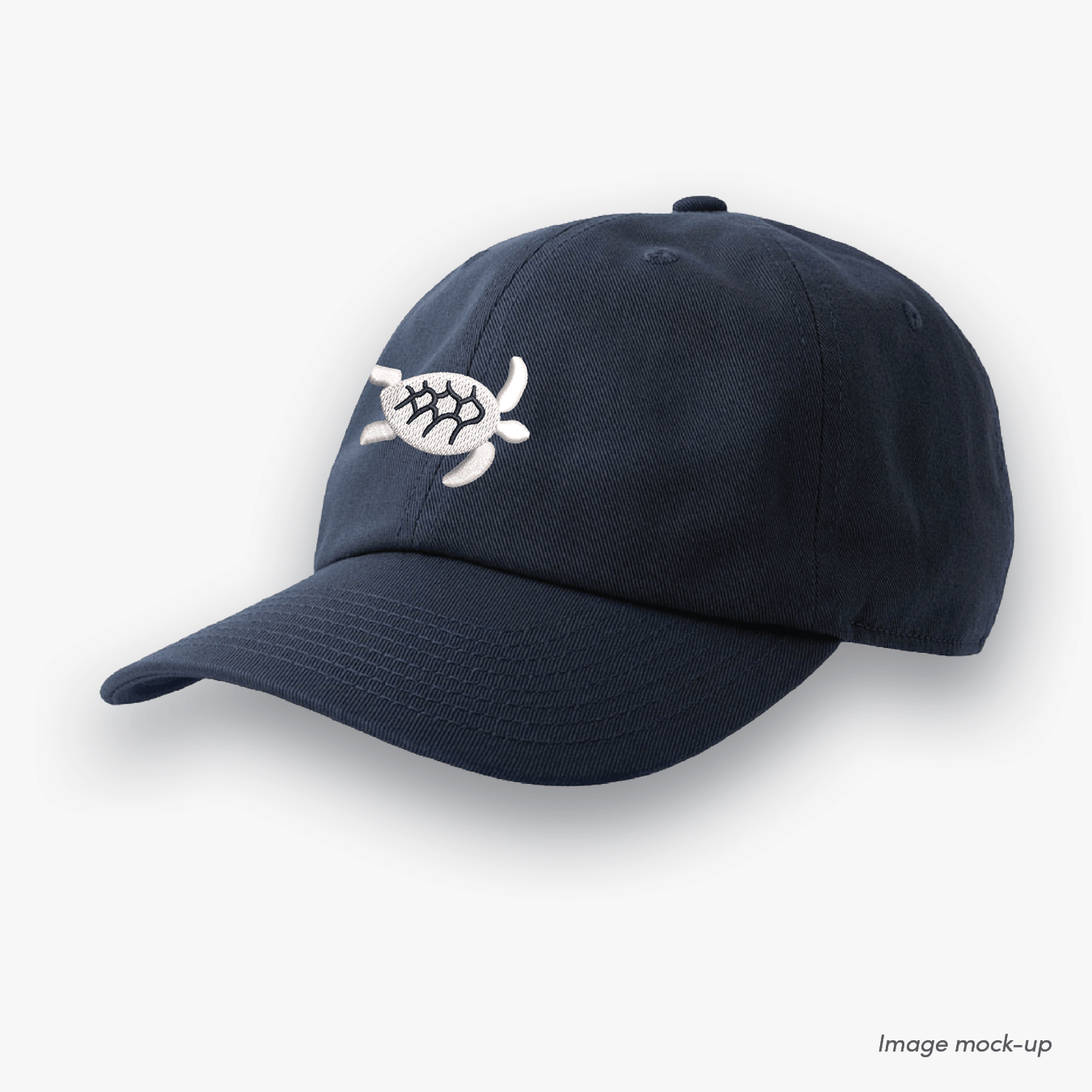 Navy-coloured Ocean Icons Dad cap with turtle embroidery centred.