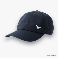 Navy-coloured Ocean Icons Dad cap with humpback whale embroidery on the side.