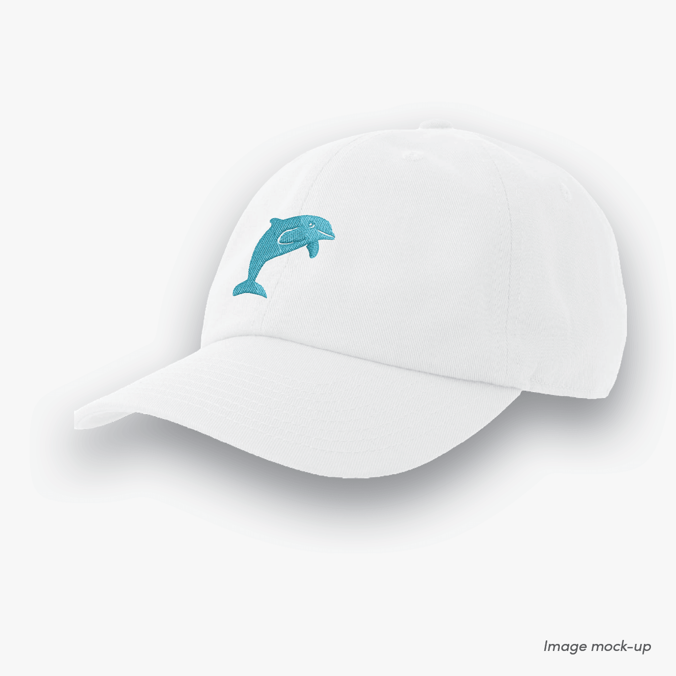 White-coloured Ocean Icons Dad cap with dolphin embroidery.