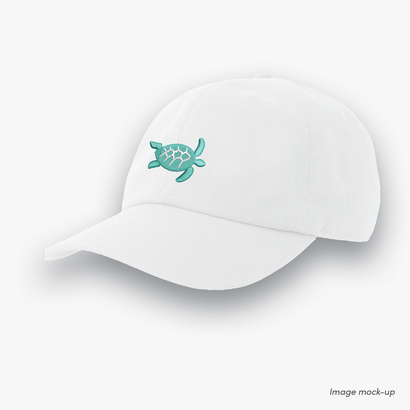 White-coloured Ocean Icons Dad cap with turtle embroidery.