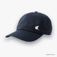 Navy-coloured Ocean Icons Dad cap with manta ray embroidery on the side.