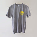 Ocean Love crew neck grey t-shirt (front) with a yellow octopus print, made from recycled materials. 