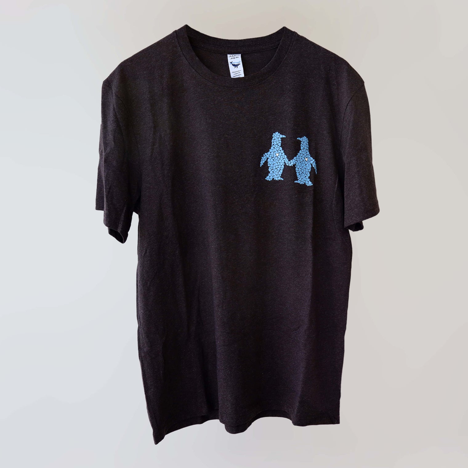 Ocean Love crew neck brown t-shirt (front) with a blue print of a pair of penguins, made from recycled materials.