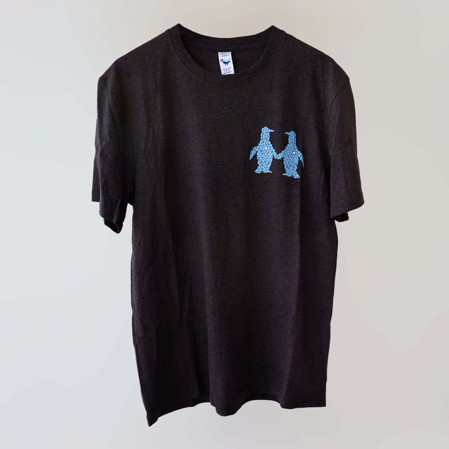 Ocean Love crew neck brown t-shirt (front) with a blue print of a pair of penguins, made from recycled materials.