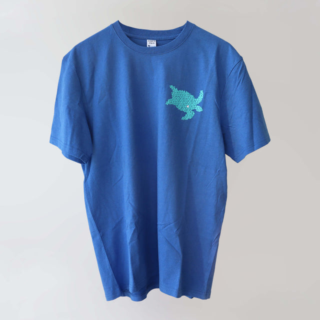Ocean Love crew neck blue t-shirt (front) with a green sea turtle print, made from recycled materials.