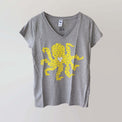 Ocean Love v-neck grey t-shirt (front) with a yellow octopus print, made from recycled materials.