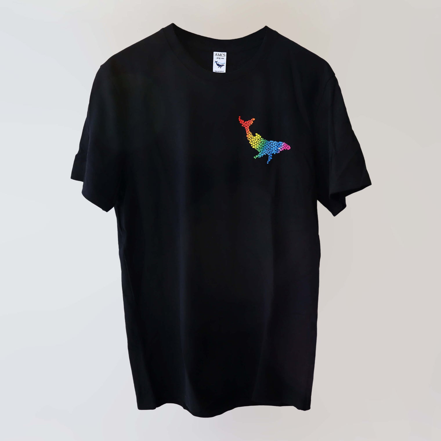 Ocean Love crew neck navy t-shirt (front ) with a rainbow humpback whale print, made from recycled materials.