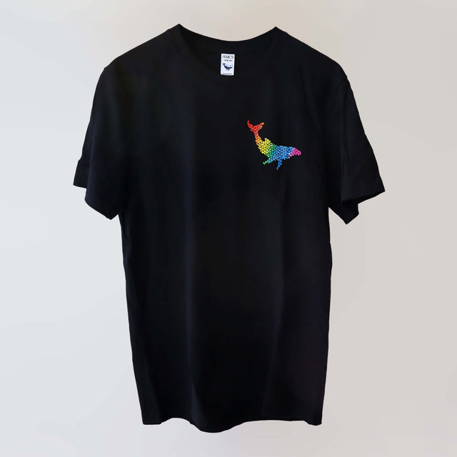 Ocean Love crew neck navy t-shirt (front ) with a rainbow humpback whale print, made from recycled materials.
