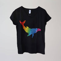 Ocean Love v-neck navy t-shirt (front) with a rainbow humpback whale print, made from recycled materials.