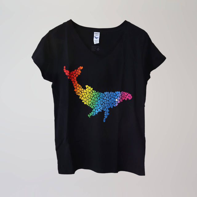 Ocean Love v-neck navy t-shirt (front) with a rainbow humpback whale print, made from recycled materials.