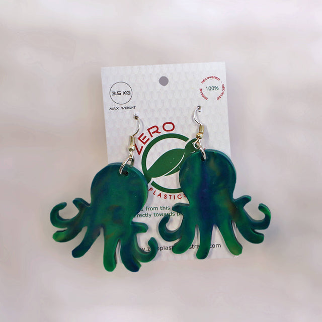 Green octopus-shaped dangle earrings, made with recycled plastic milk bottle lids by Zero Plastics Australia.