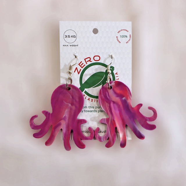 Pink octopus-shaped dangle earrings, made with recycled plastic milk bottle lids by Zero Plastics Australia.