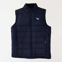 Navy puffer vest embroidered in white with a humpback whale (front).