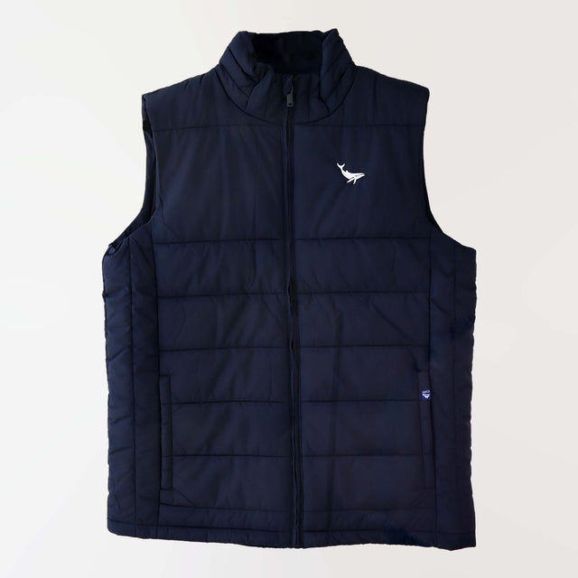 Navy puffer vest embroidered in white with a humpback whale (front).