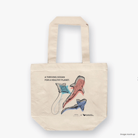 A natural canvas tote bag featuring screen-printed artwork of whale sharks and a manta ray by Guy Shoval, together with the AMCS vision statement: "A thriving ocean for a healthy planet".