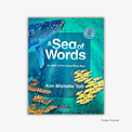 'A Sea of Words' cover by Kim Michelle Toft, featuring a vibrant illustration of the colourful coral, flora and wildlife.